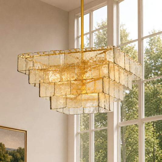 Original Kythara layered textured glass chandelier by a large window — source reference scene