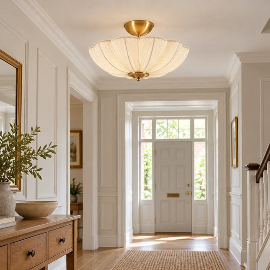 Pleated flower ceiling light centred in a proportionate hallway