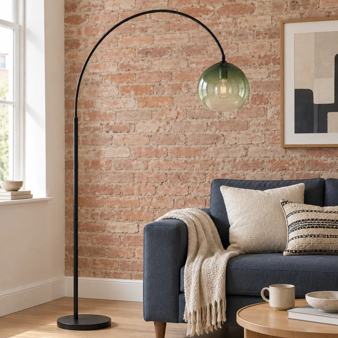 Modern adjustable arc floor lamp in a compact living room