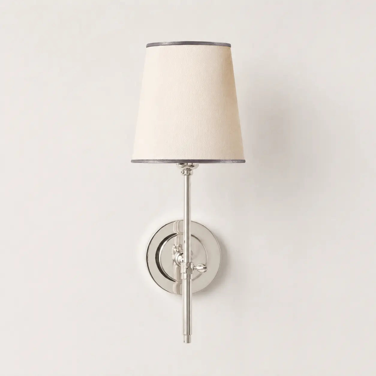 Chrome tapered linen shade wall light studio view