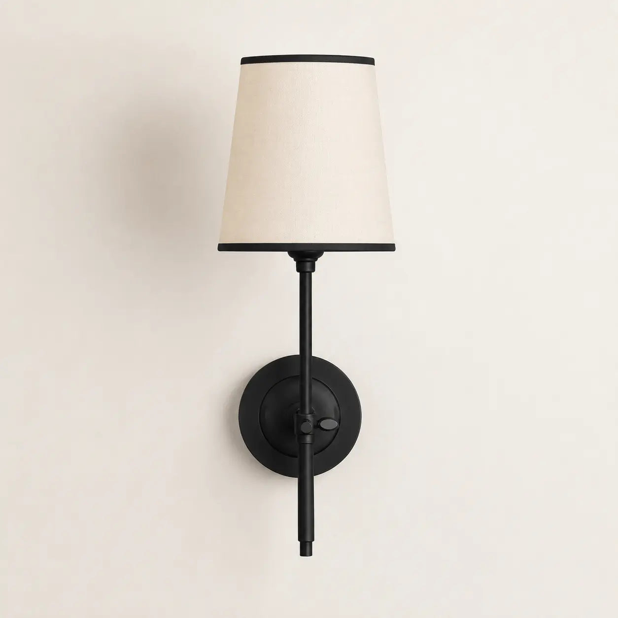 Black tapered linen shade wall light studio view
