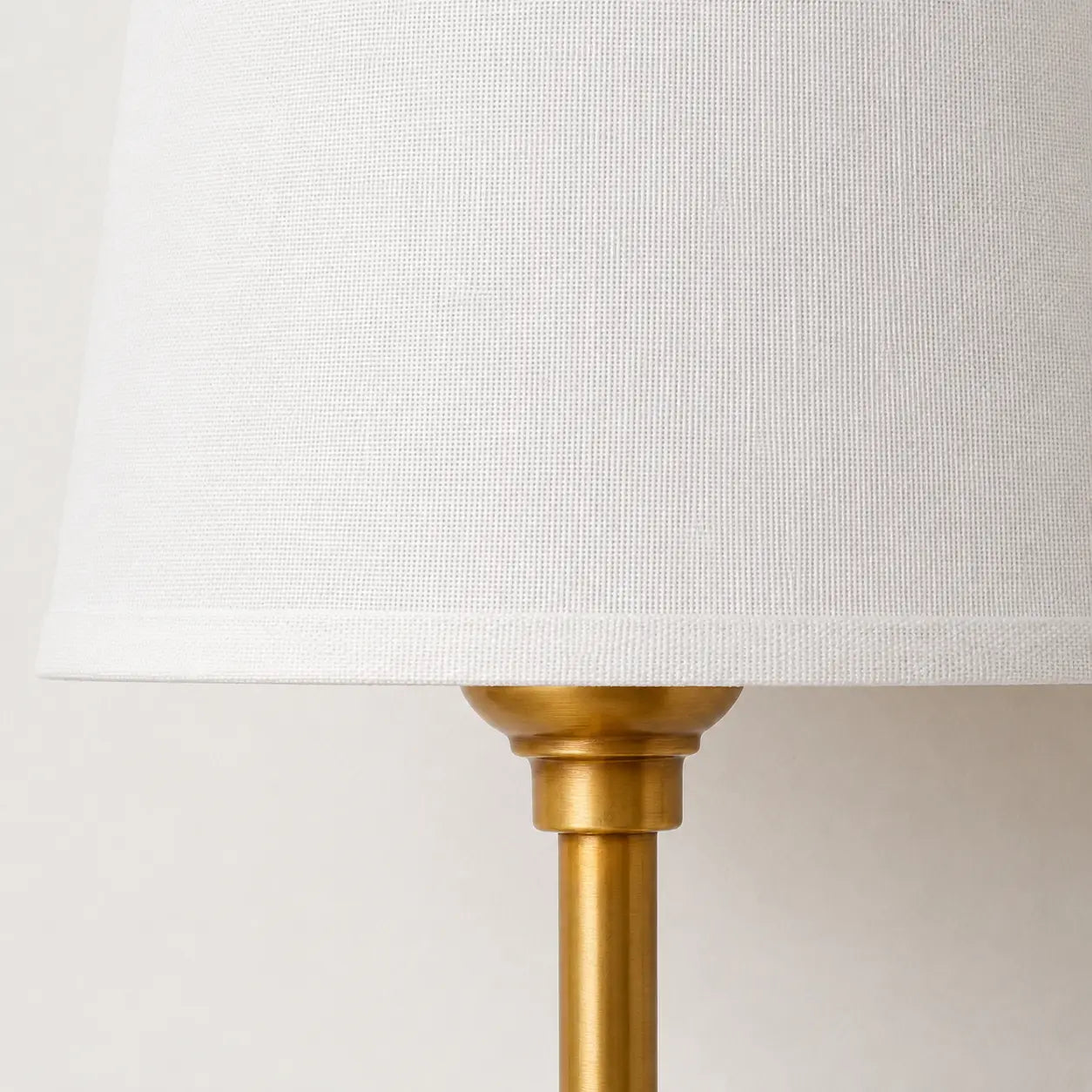 White linen shade weave and brass holder detail