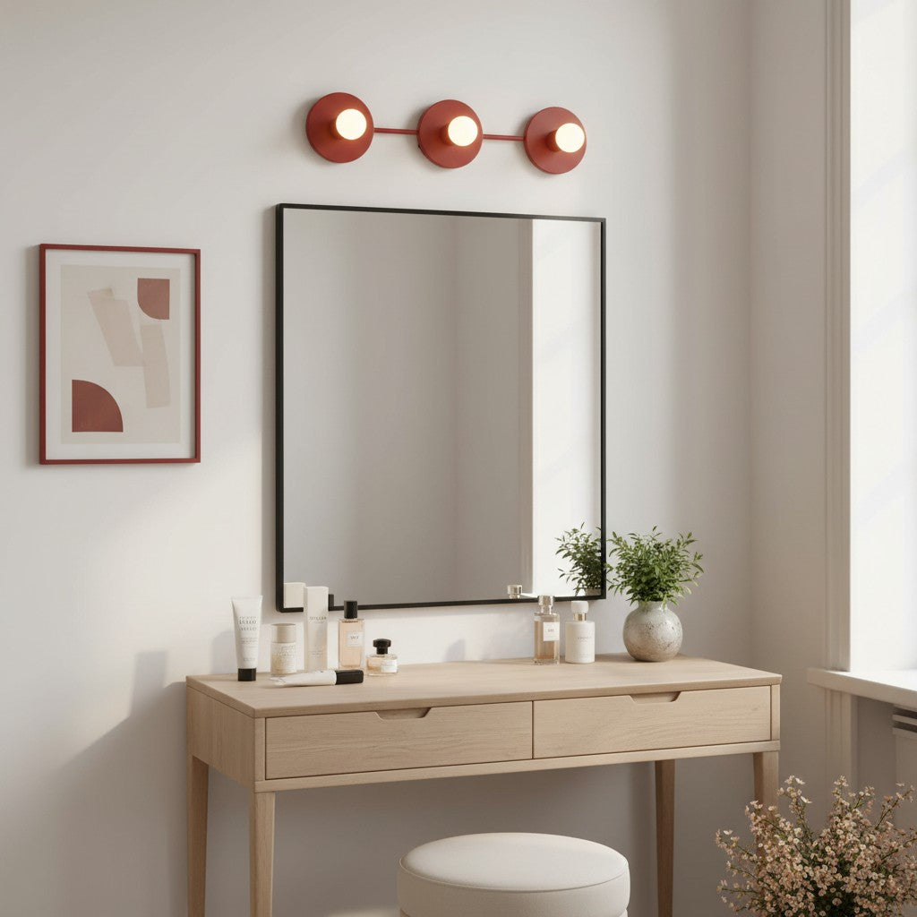 Dressing table with mirror, lights, and decor in a room setting