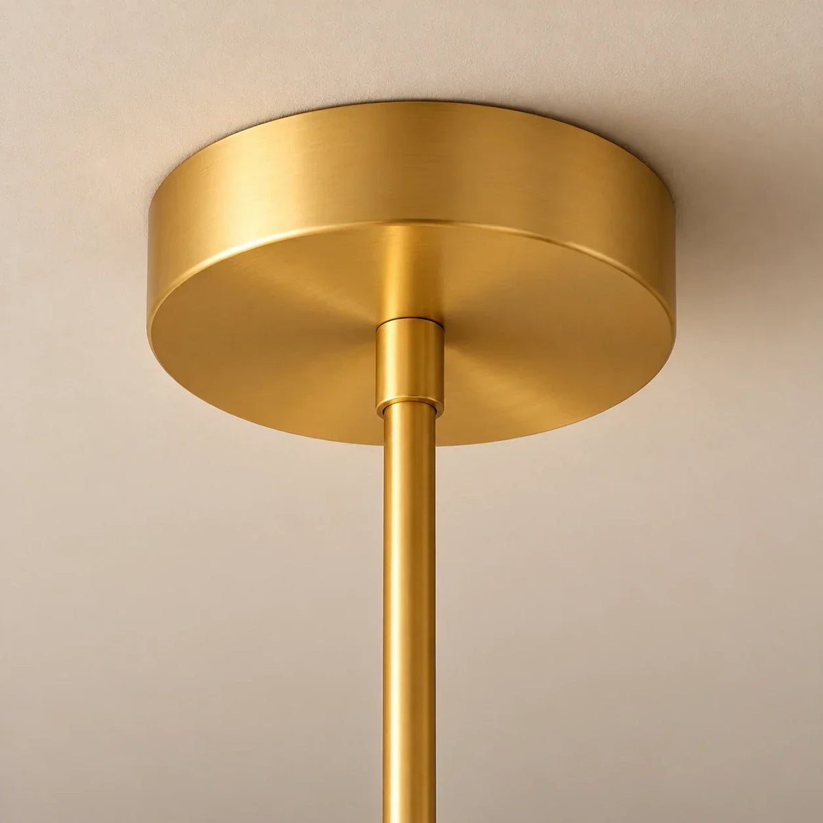 Gold ceiling canopy installed against beige ceiling