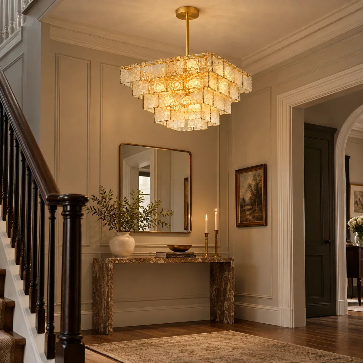 Original entrance hall scene with gold and glass chandelier