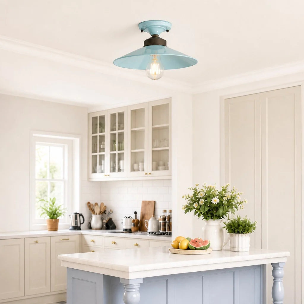 Kitchen with a light blue ceiling light fixture, white cabinets, and a marble countertop.