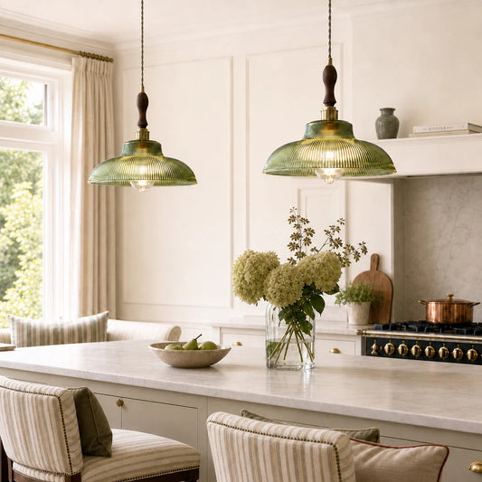 Modern kitchen with pendant lights, countertop decor, and a stove.