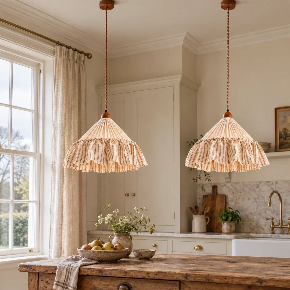 Two Coffee Stripe Amelie pendants over a long country kitchen island; each sold separately
