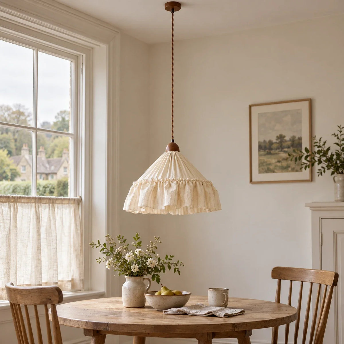 Apricot Stripe Amelie pendant over a breakfast table